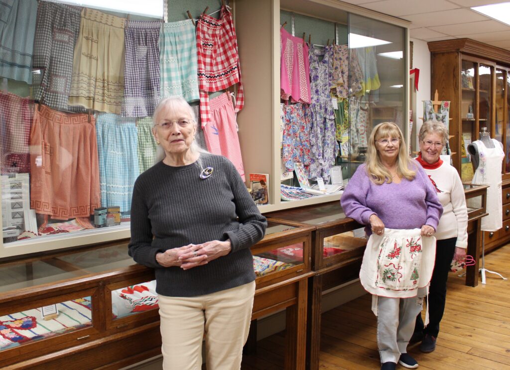 Exhibit organizers RoseMarie Baab, Margaret King, and Sandi Keim