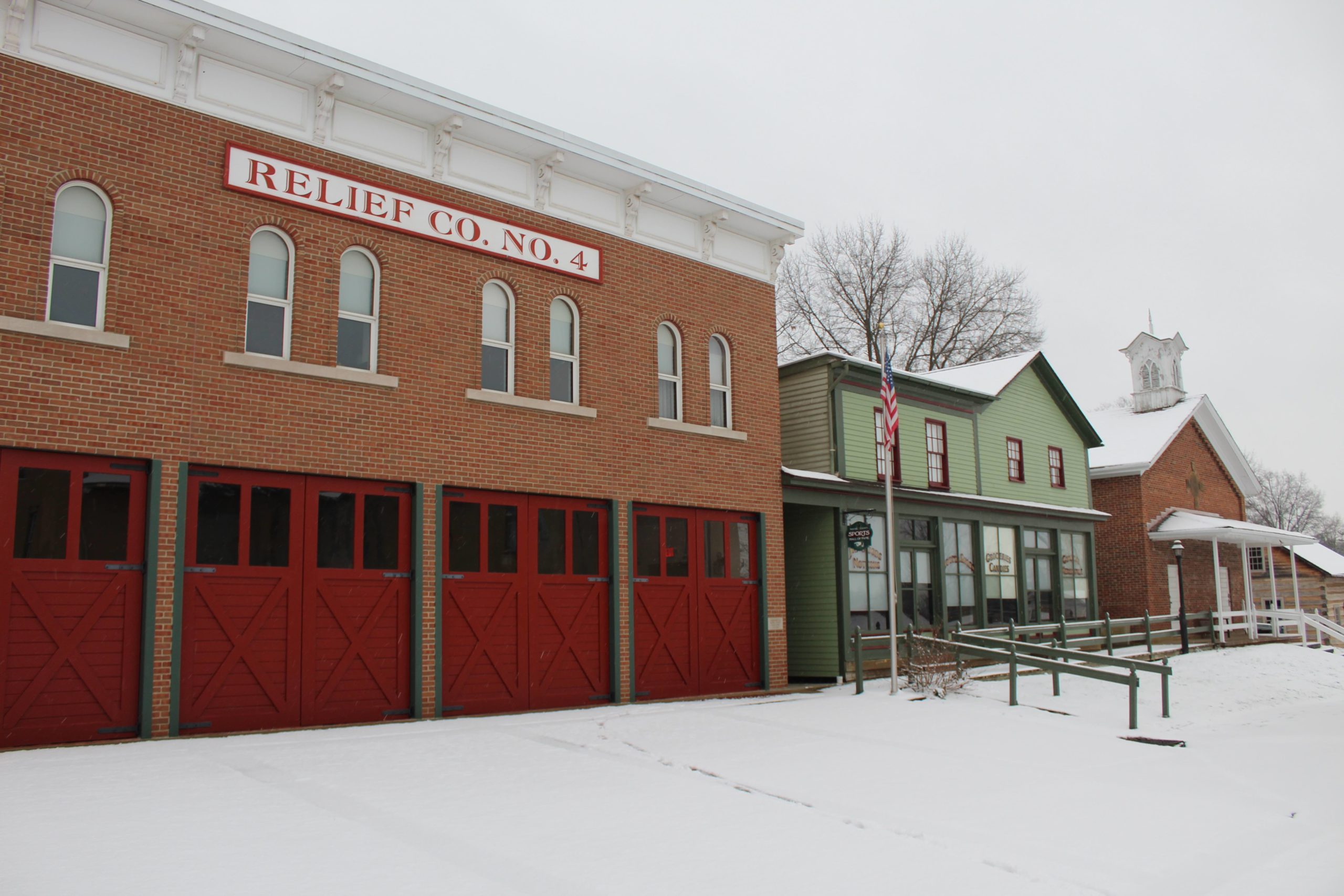 firehouse, shops in snow